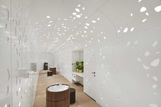 Ultra-modern and pristine white changing room facilities in a luxury London club