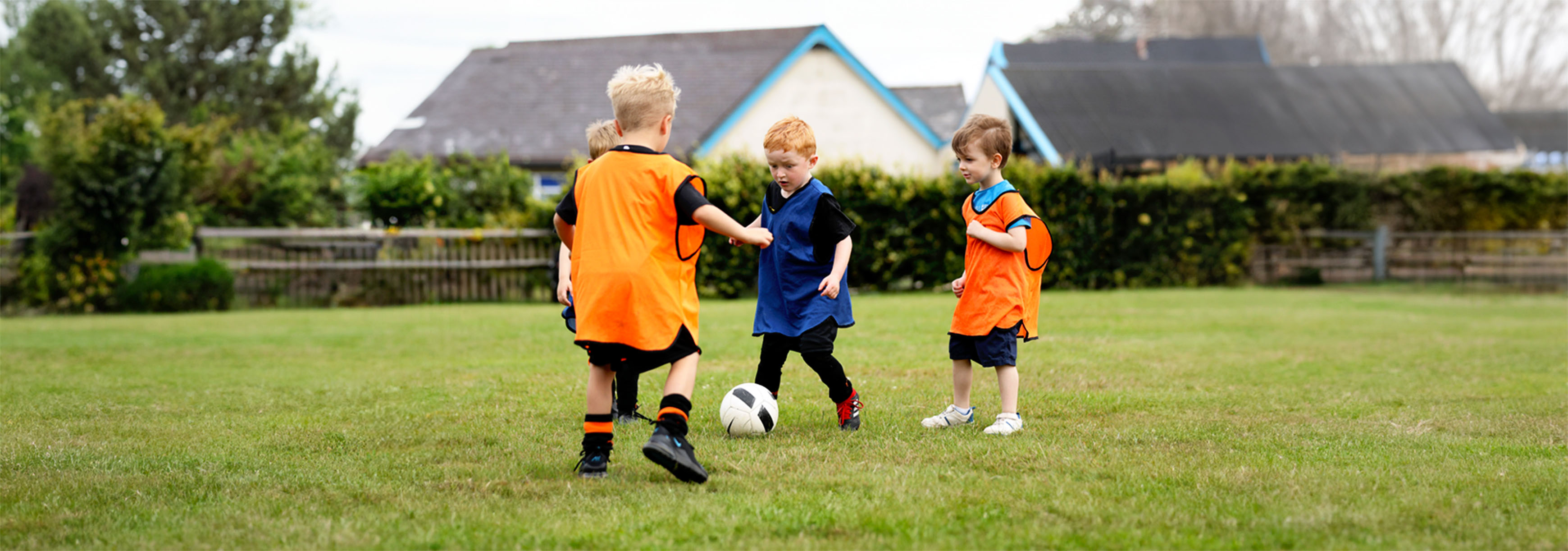 A group of women playing a small-sided 2v2 football game.