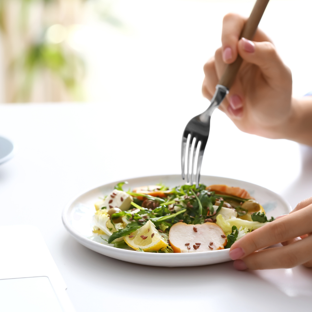 A variety of fresh, colorful vegetables and healthy ingredients arranged on a table.