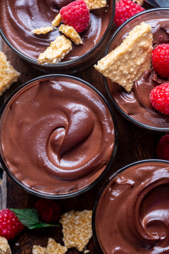 Close-up of smooth, dark chocolate tahini mousse texture.
