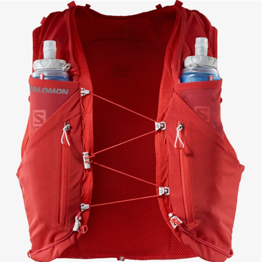 The Salomon Adv Skin 12 hydration vest with soft flasks visible in the front pockets.
