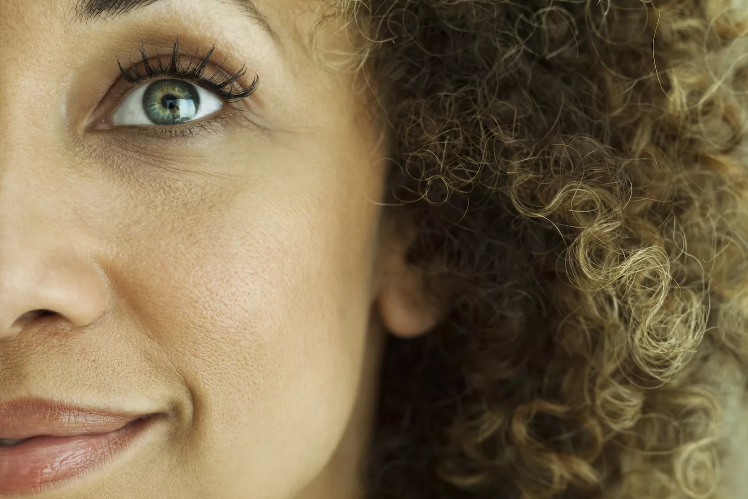 A close-up photograph of a woman's eyes.