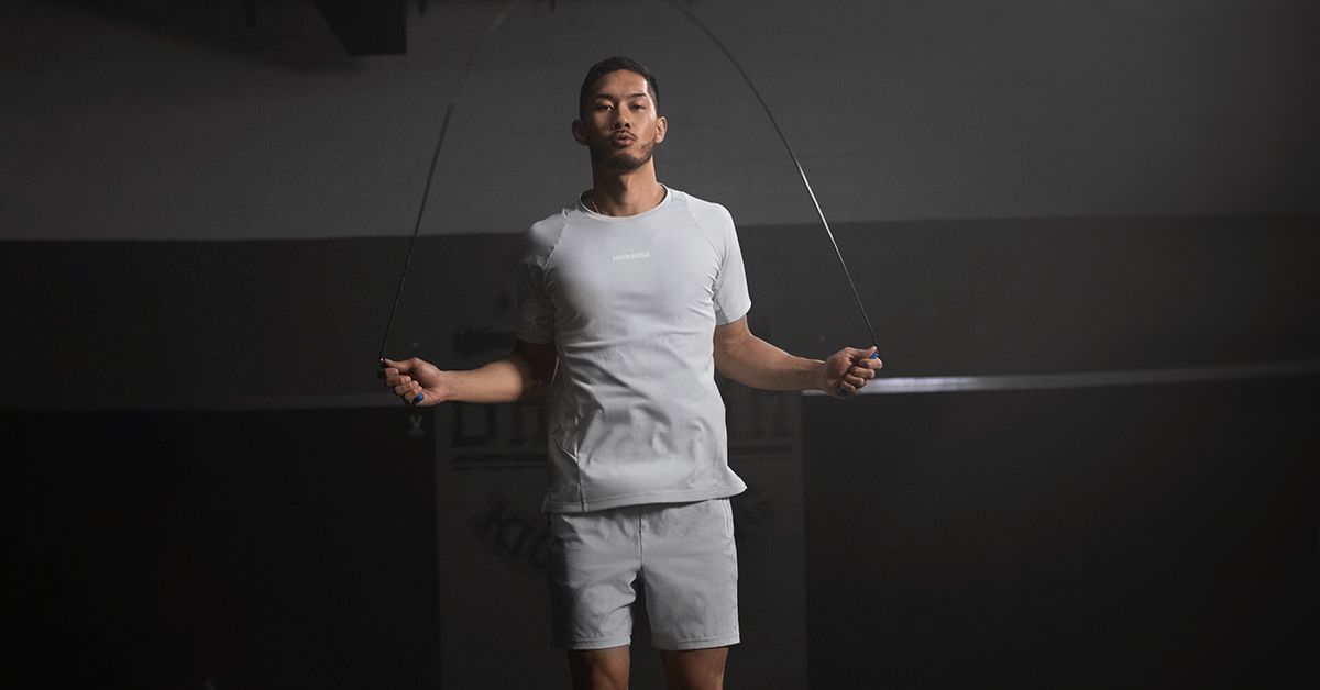A person using a speed jump rope for a cardiovascular conditioning workout.