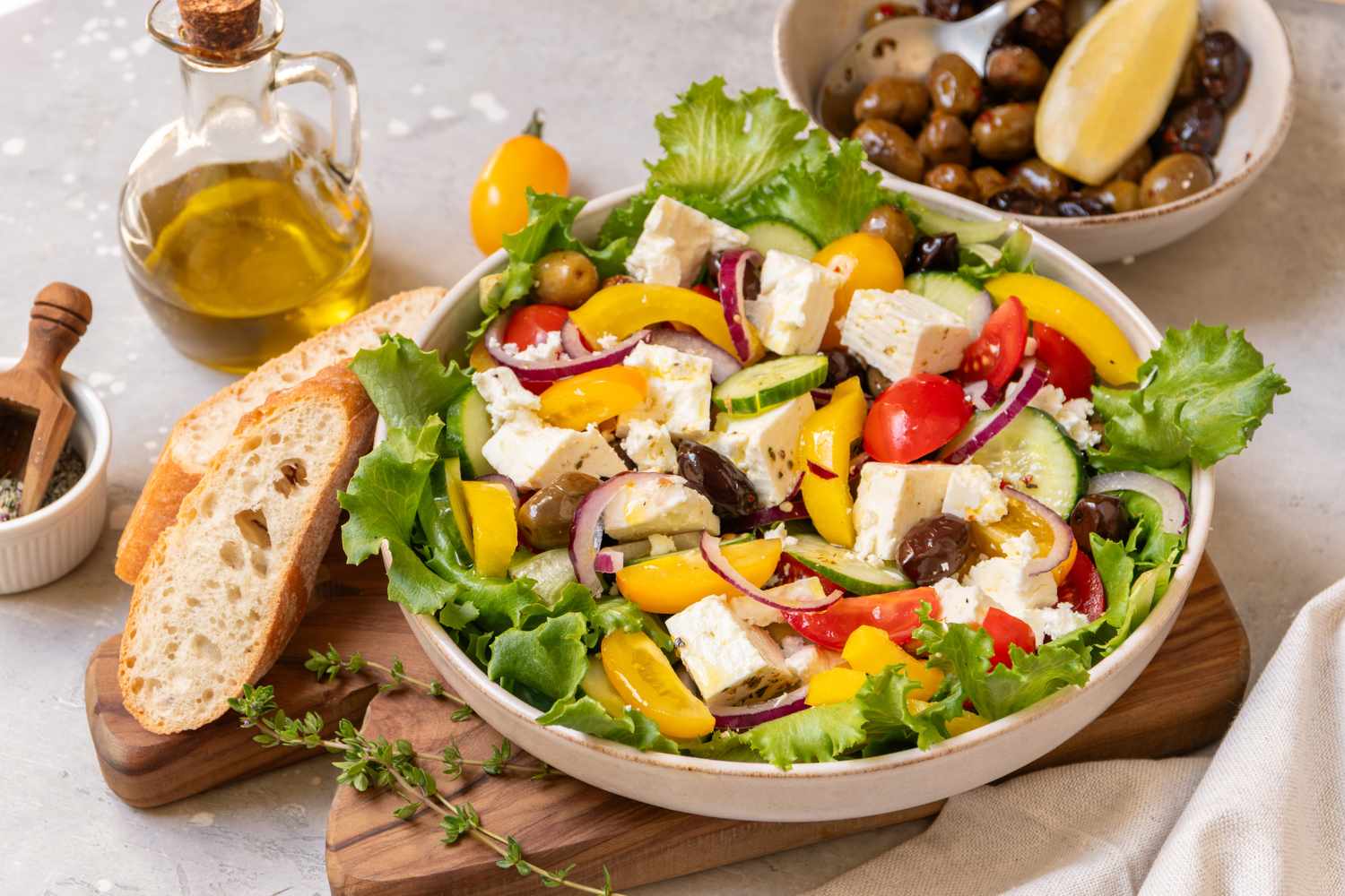 A traditional Greek salad with feta cheese, olives, and fresh vegetables.