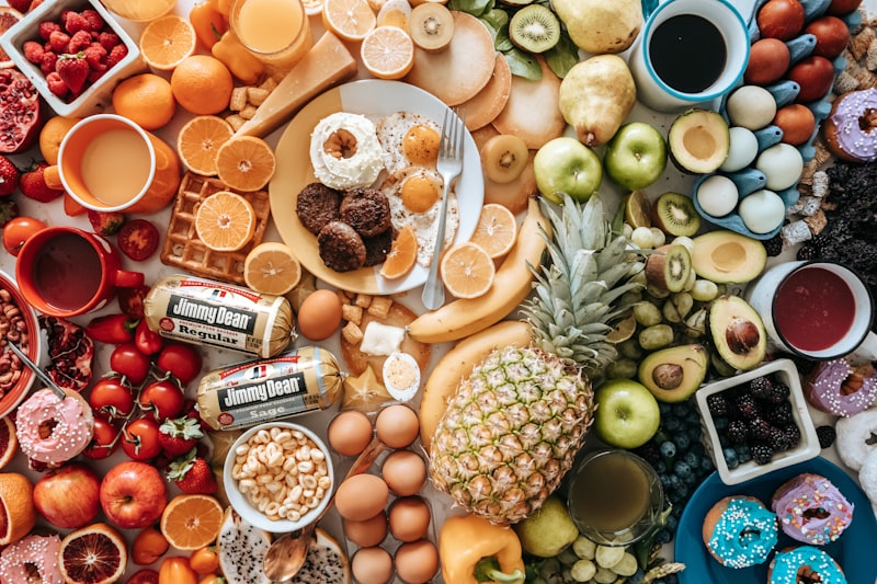 A variety of animal-based food sources high in B12 including red meat, fish, and eggs.