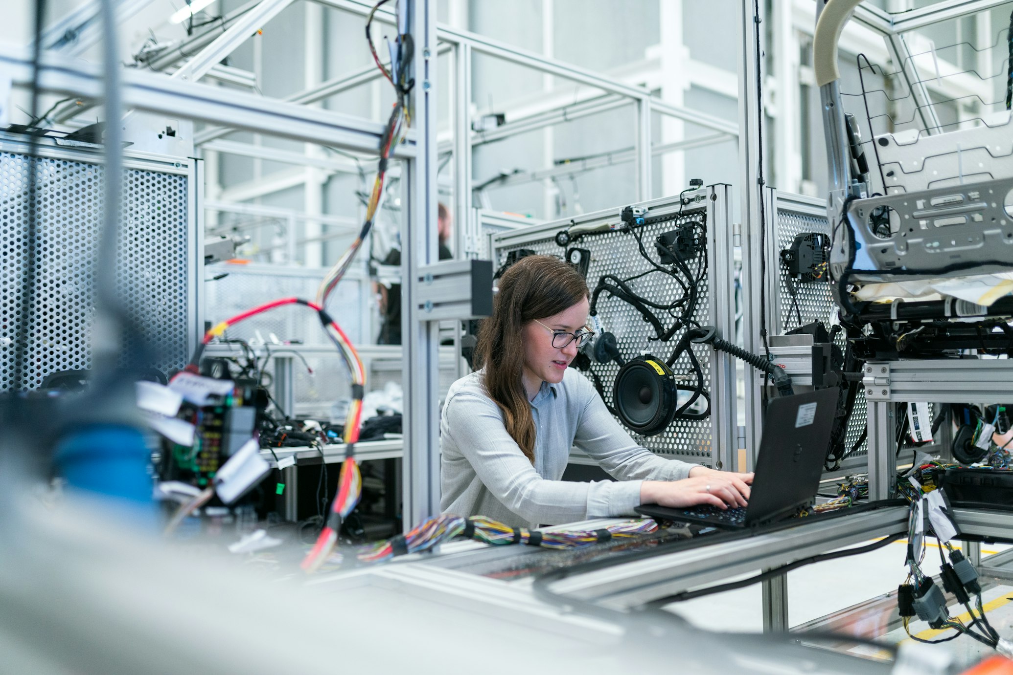 Perspective view of a sterile, modern pharmaceutical production line inside a manufacturing plant.
