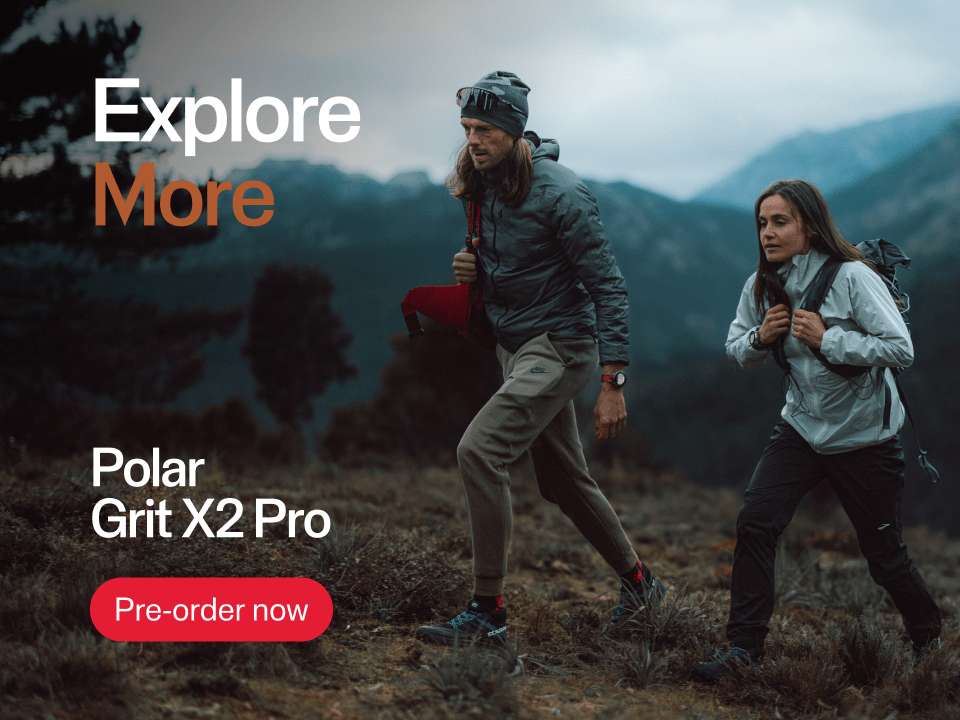 A Polar Grit X2 Pro sports watch on a runner's wrist.