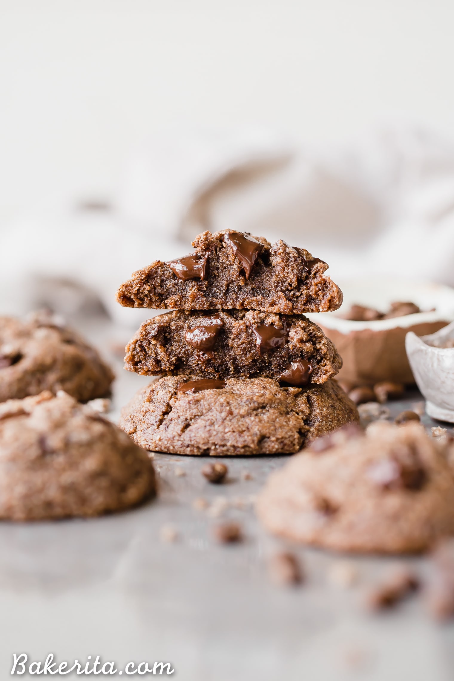 Close-up of a broken mocha cookie revealing a soft, indulgent center.