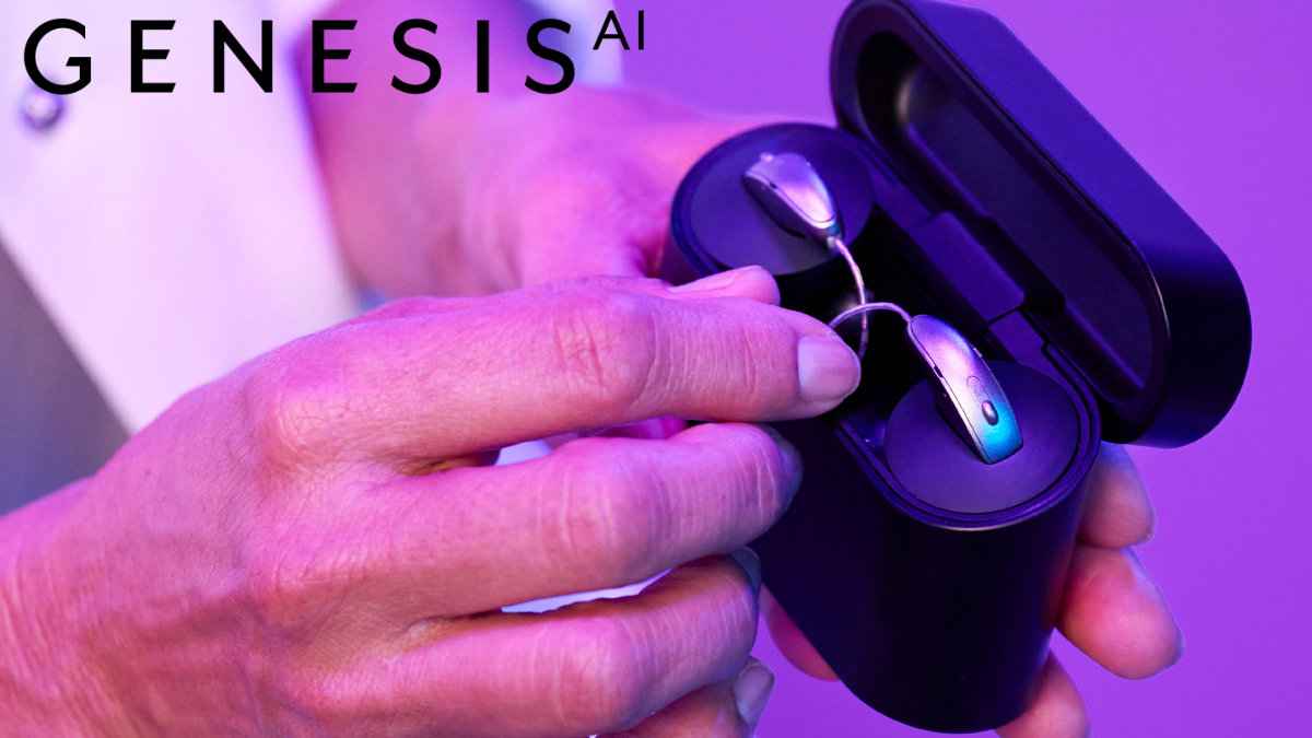 Close-up of Starkey Genesis AI hearing aids in their charging case.