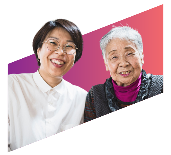 A senior woman and her adult child looking at Medicare information on a tablet together.