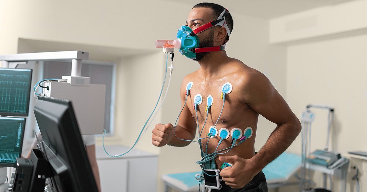A professional sports science setting showing equipment used for measuring cardiorespiratory endurance.