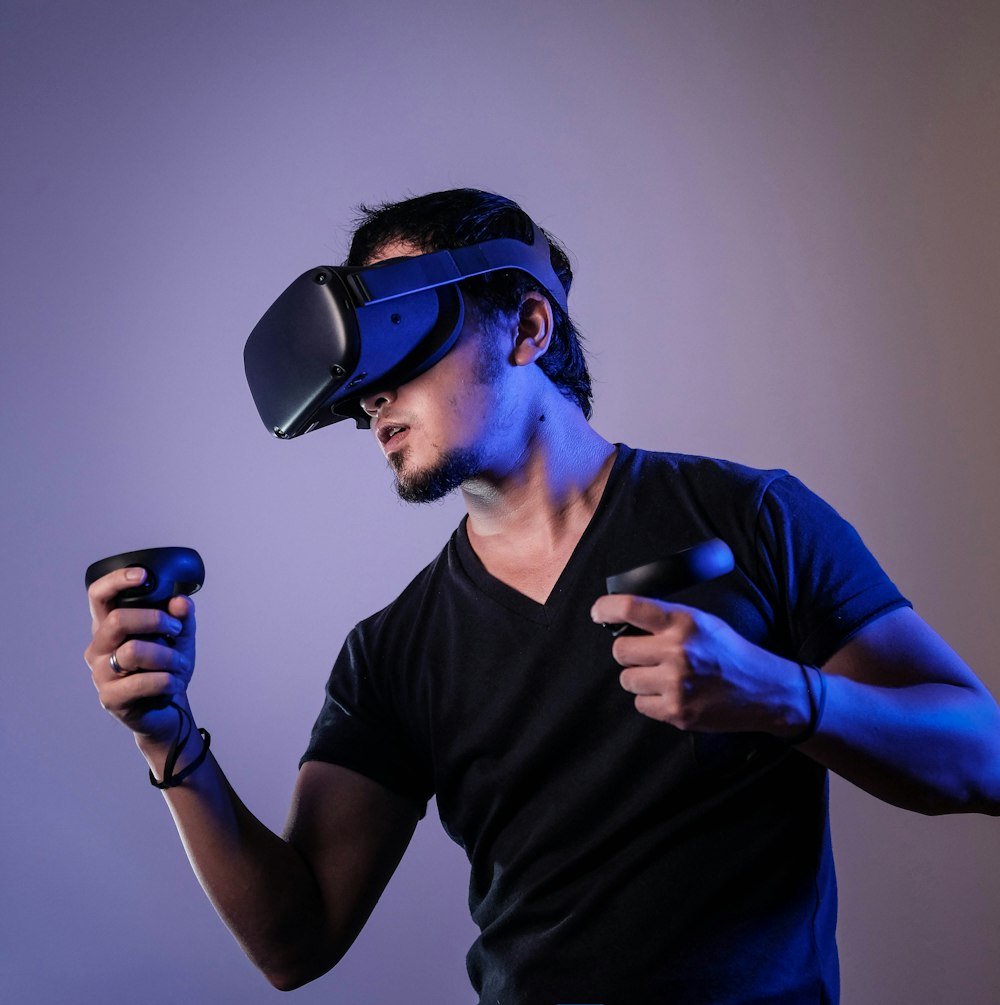 A person using bone conduction headphones to listen to the television at home.