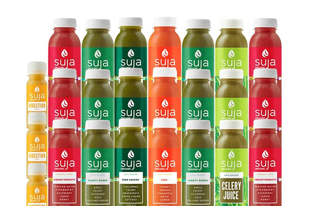 An array of Suja Organic cold-pressed juices in green, pink, and orange hues.