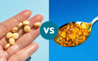A side-by-side comparison of yellow tablets in a hand and golden softgels on a spoon.
